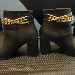 Steven madden black leather booties with gold chain. Worn once